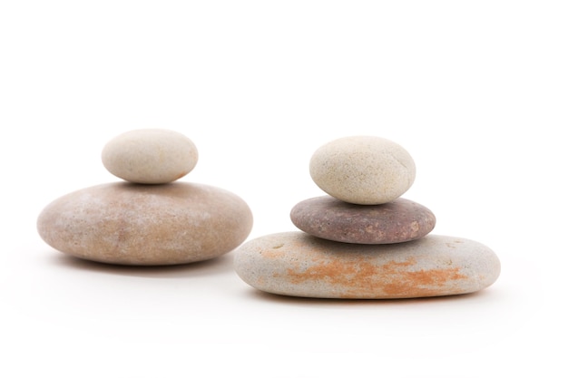 Close-up of stones against white background