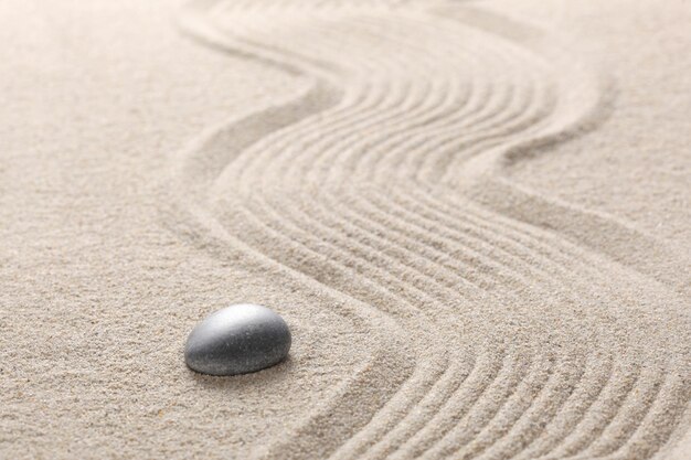 Close-up of stones on sand