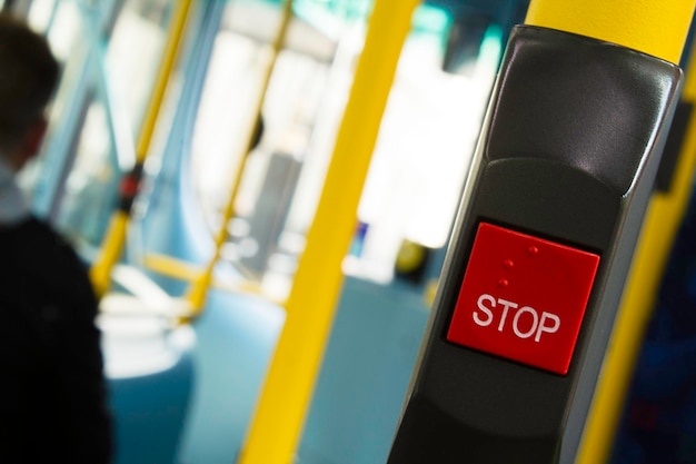 Close-up of stop button in bus