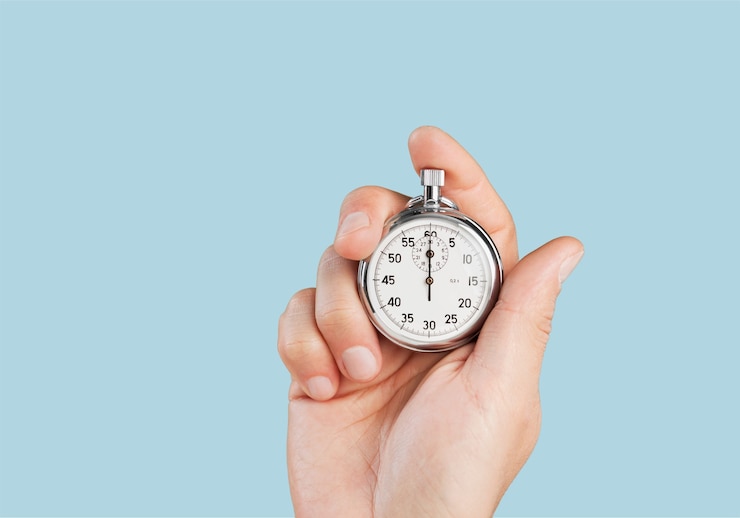 Photo close-up stopwatch in human hand, timer