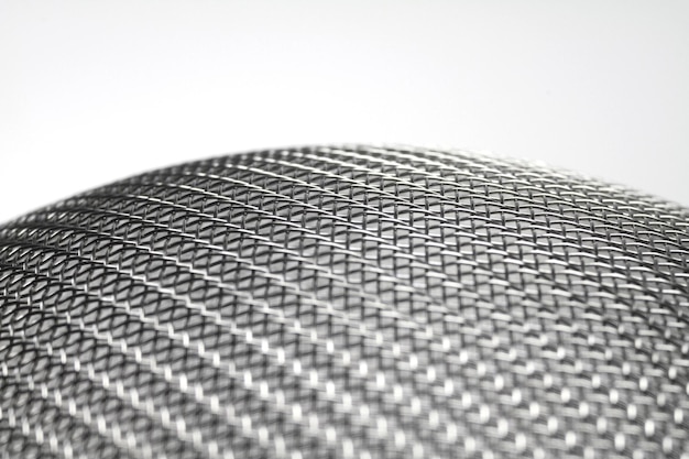 close-up of strainer against white background