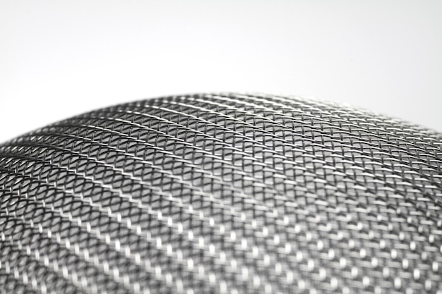 Photo close-up of strainer against white background