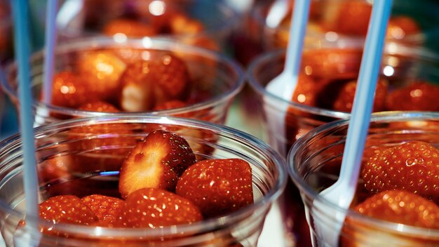 Close-up of strawberries in glass containers