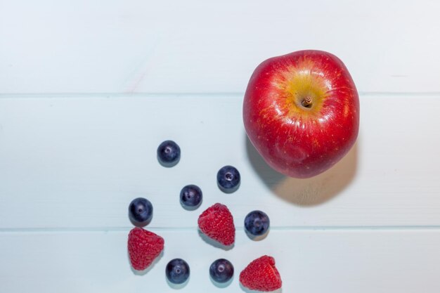 Close-up of strawberry over white background