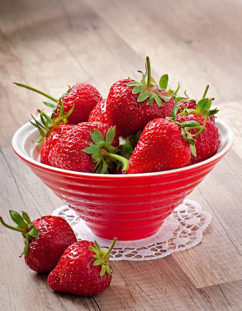 Close up of strawberry on wooden background