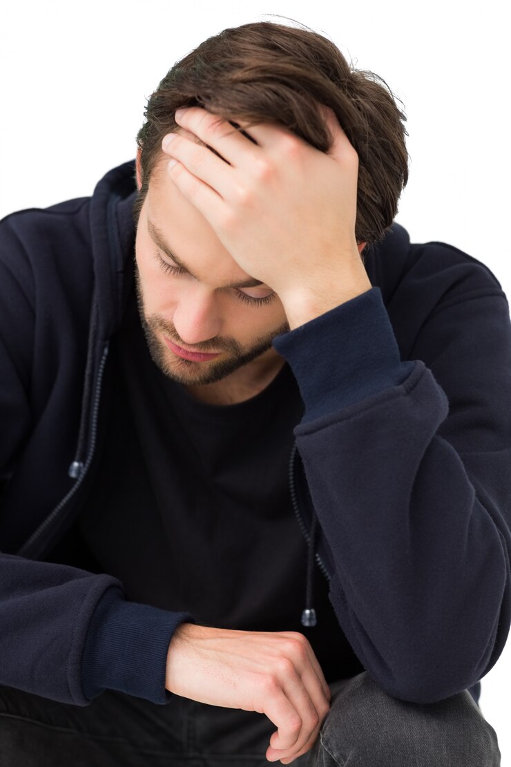 Close-up of a stressed handsome young man