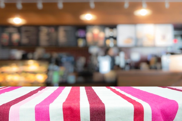 Photo close-up of striped tablecloth on table