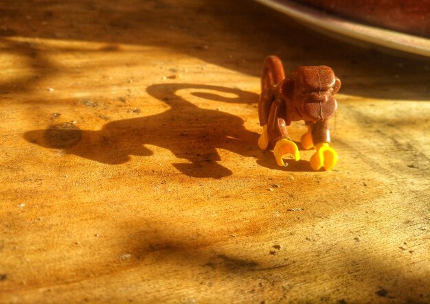 Close-up of stuffed toy on sand