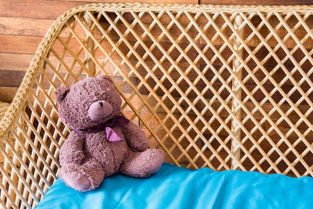 Photo close-up of stuffed toy on sofa