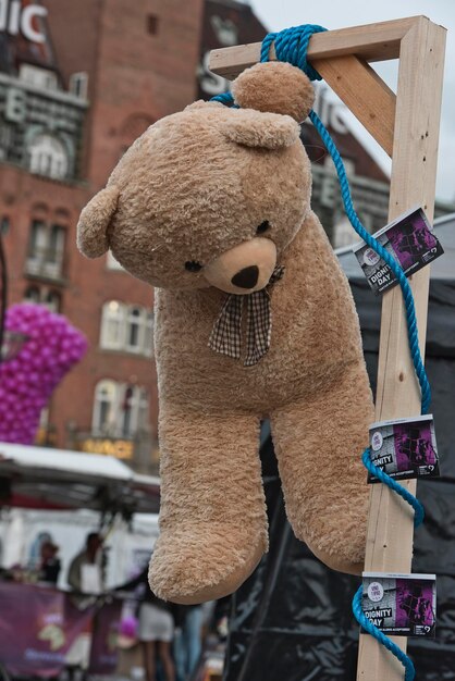 Photo close-up of stuffed toy on street