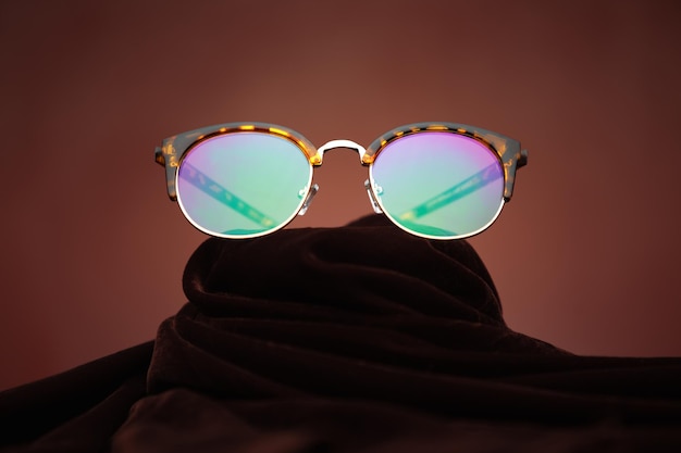 Close-up of sunglasses in darkroom