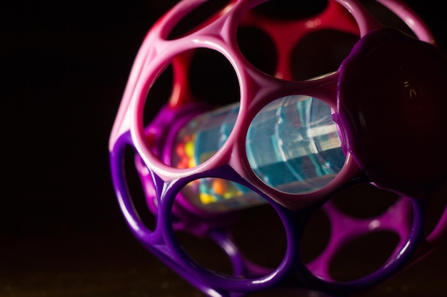 Photo close-up of sunglasses on glass against black background