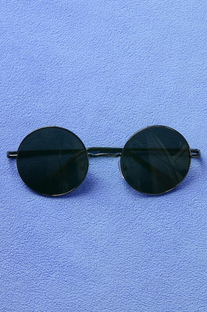 Close-up of sunglasses on wall