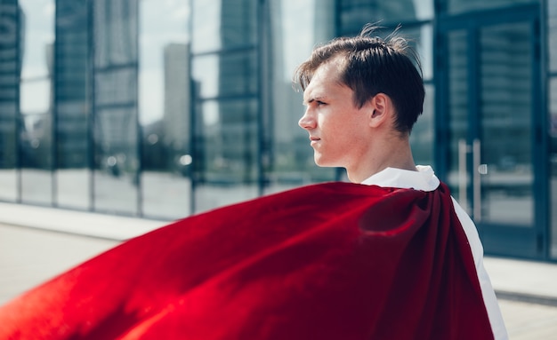 Close up superhero doctor looking at a city street