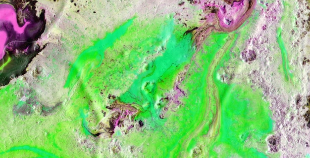 A close up of a surface with a green and purple color.