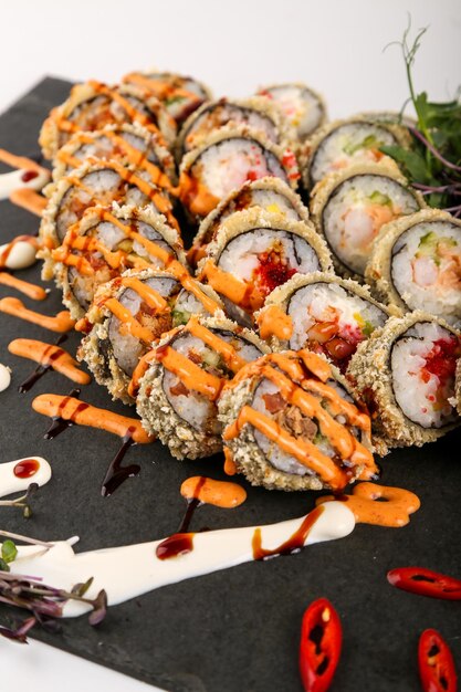 Photo close-up of sushi served in plate