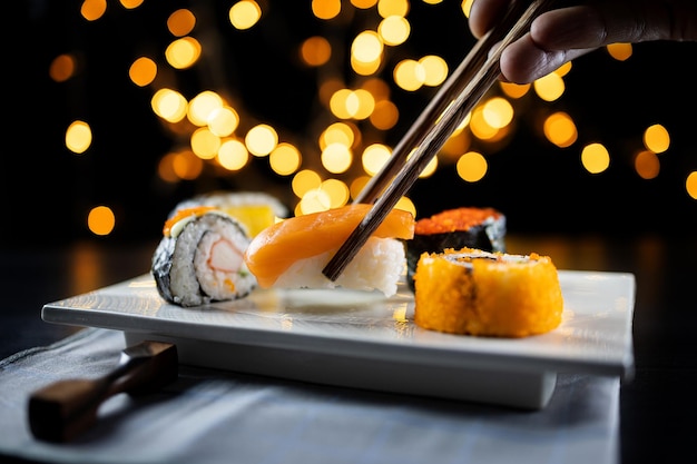 Photo close-up of sushi served on plate