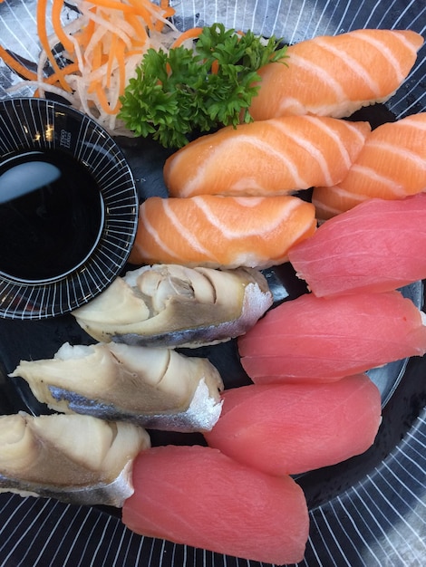 Photo close-up of sushi served in plate