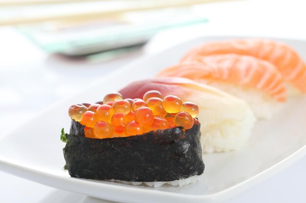 Photo close-up of sushi served in plate