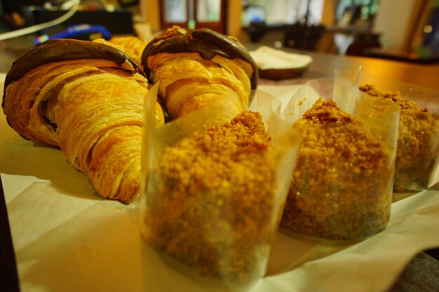 Close-up of sweet food served on table at store