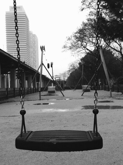 Photo close-up of swing in city