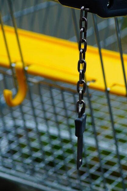 Photo close-up of swing in playground