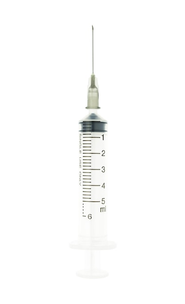 Photo close-up of syringe against white background