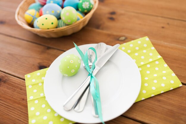 close up of table setting and easter eggs