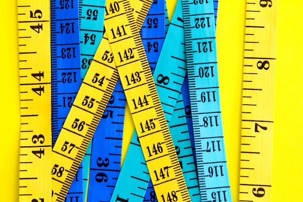 Close-up of tape measure on table