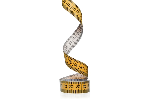 Close-up of tape measure on white background
