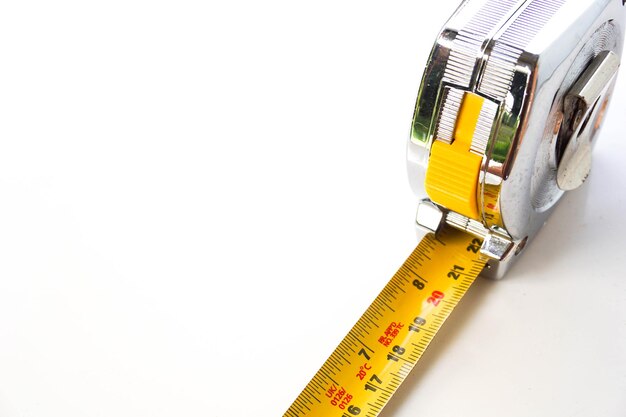 Photo close-up of tape measure on white background