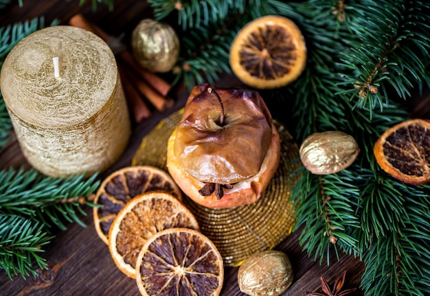 Close up of a tasty baked apples with christmas decoration