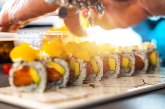 Photo close up of tasty japanese uramaki sushi with salmon