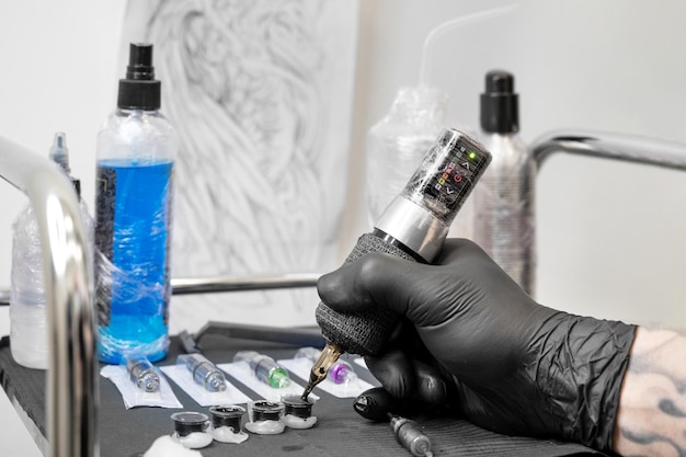 Close up of tattoo artist tools and workplace High quality photo