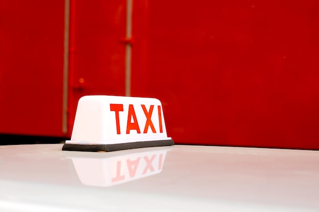 Close-up to a taxi sign in the streets of hong kong china