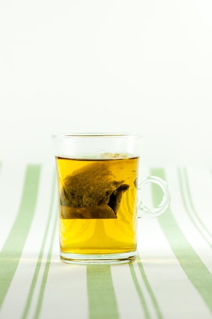 Close-up of tea cup against white background