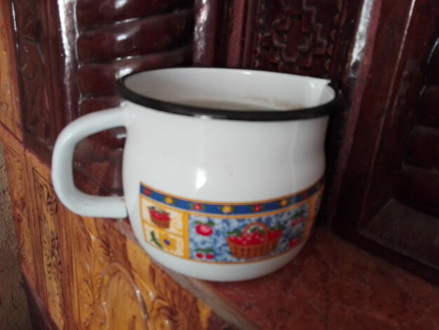 Close-up of tea cup on table