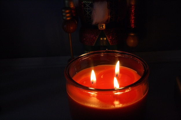 Close-up of tea light candle on table