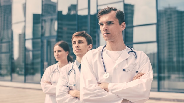 Close up. team of doctors standing on a city street. photo with a copy-space.