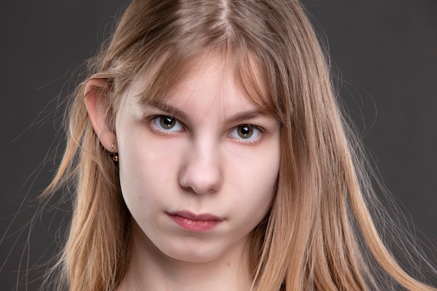 Close-up of a teenage girl's face.