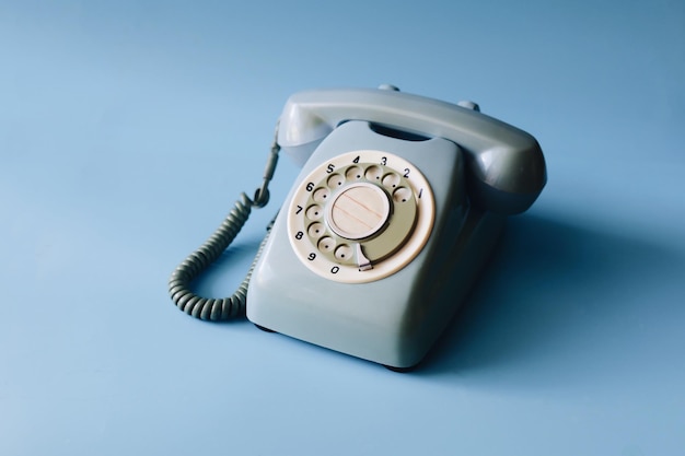 Close-up of telephone booth on table