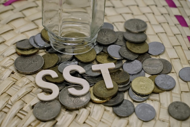 Close-up of text and coins