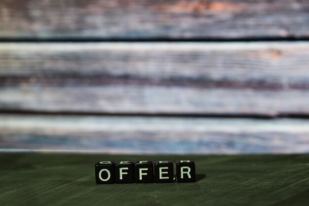 Photo close-up of text on wood at beach