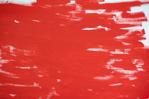 Close up Texture Red color paint on white colour canvas Brush marks stroke for paper graphic design on background