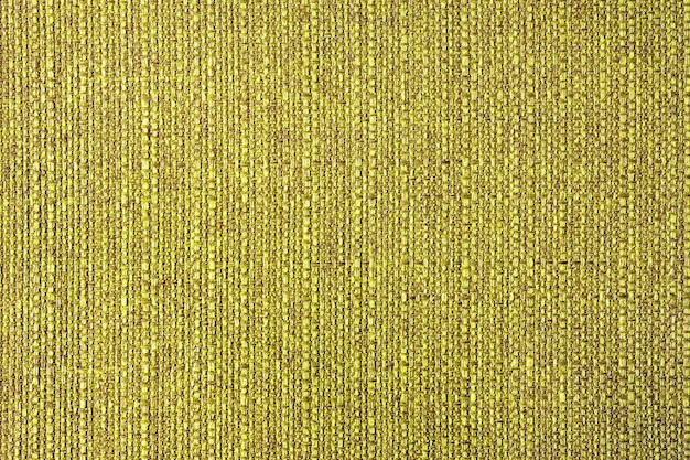 Close up texture of yellow coarse weave upholstery fabric Decorative textile background