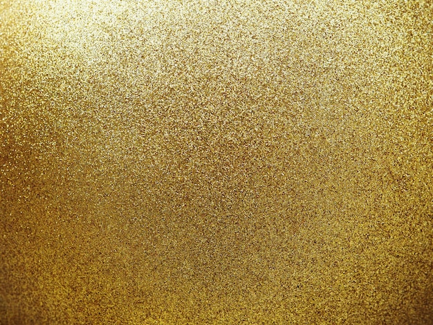 Close up textured of golden round ball with glitter.