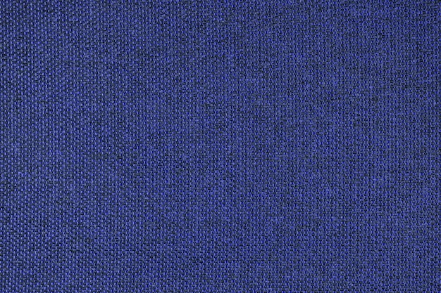 Close-up textuur van blauwe grof geweven stoffering decoratieve textiel background