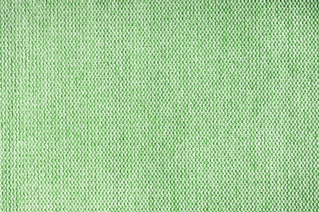 Close-up textuur van groene grof geweven stoffering decoratieve textiel background