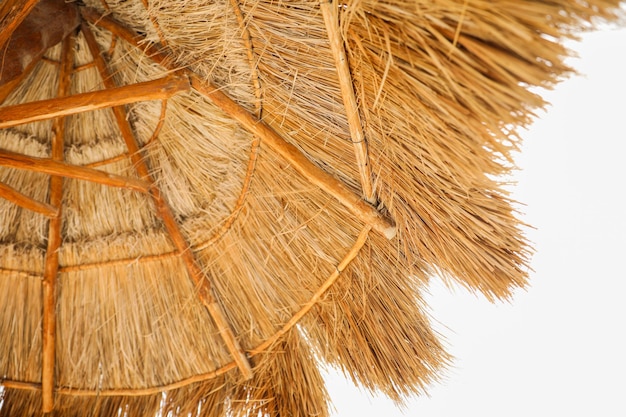 A close up of a thatched roof