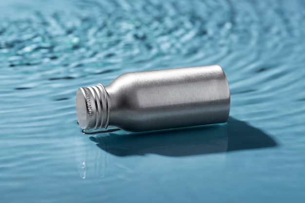 Close up on thermos floating on water